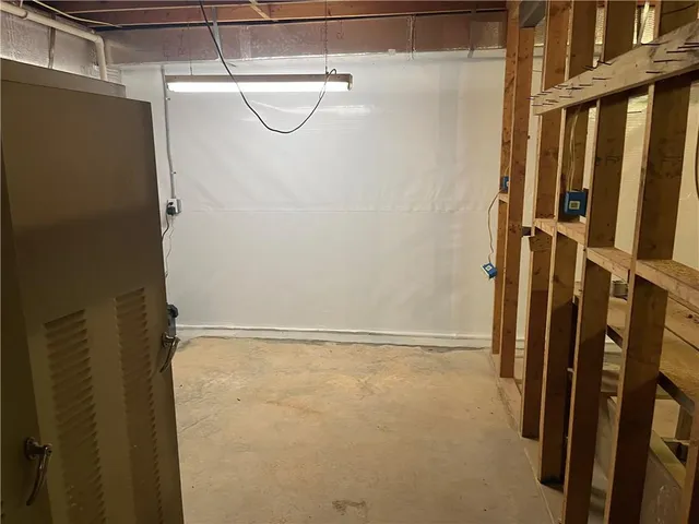 a kitchen with a refrigerator sink and stove