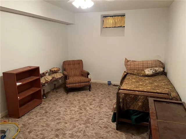 a kitchen with a sink a stove and cabinets