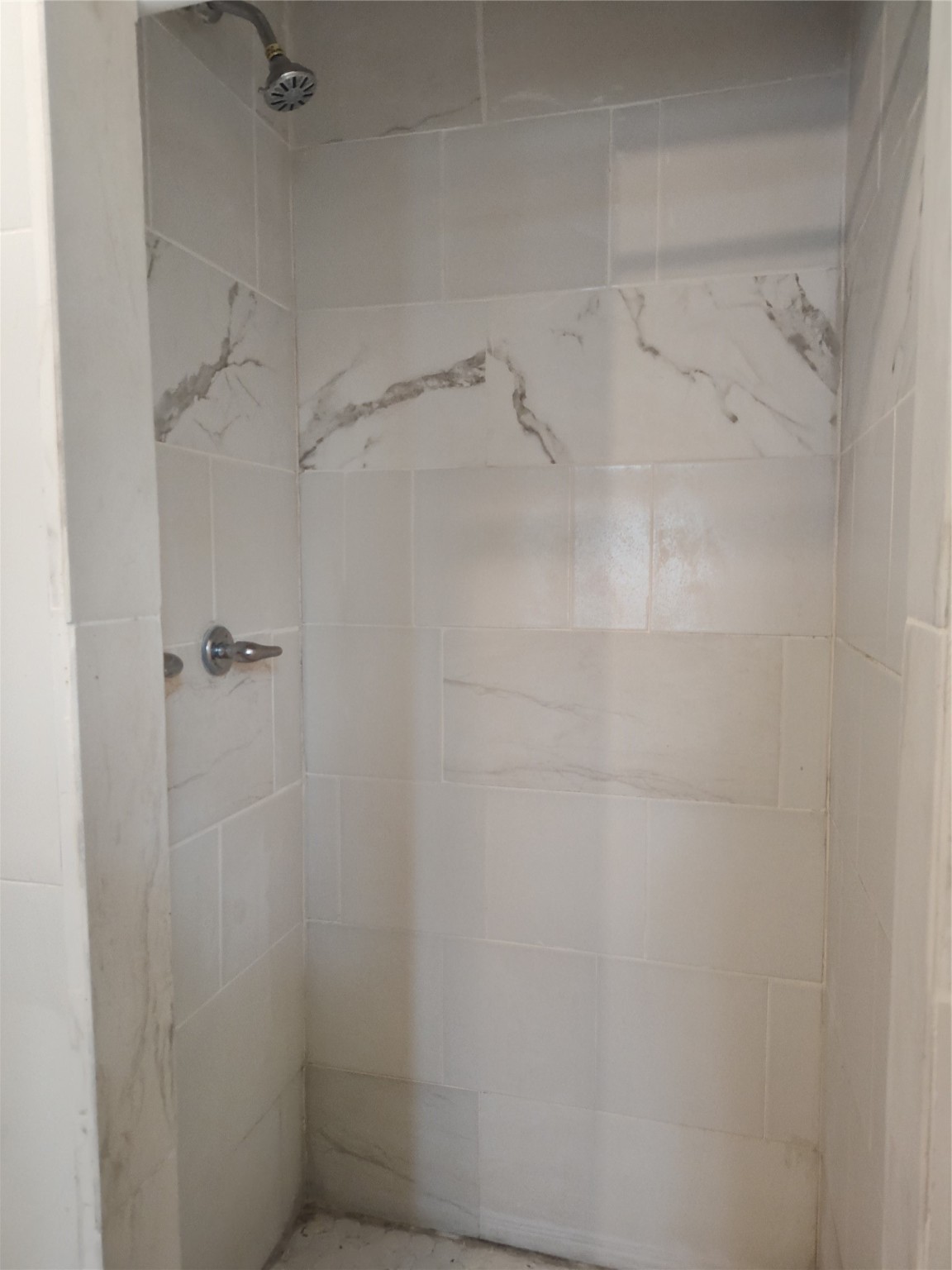 527 West 6th Street Freeport, TX 77541 - Photo 14 of 25 a bathroom with a shower