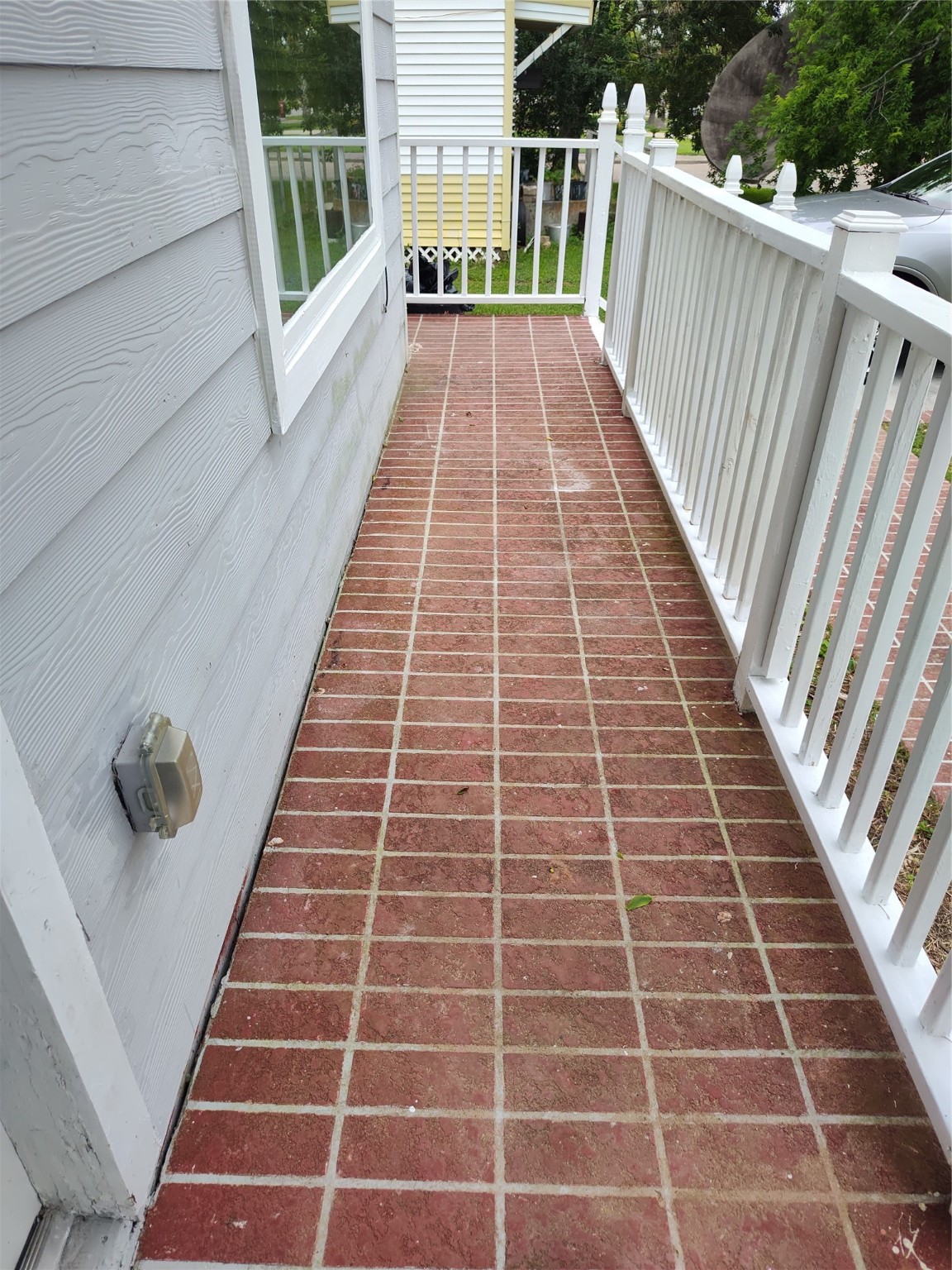 527 West 6th Street Freeport, TX 77541 - Photo 21 of 25 a view of a balcony with door