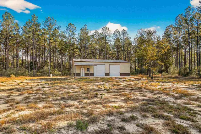 a view of a room with wooden walls