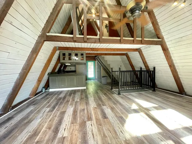 a view of entryway with wooden floor