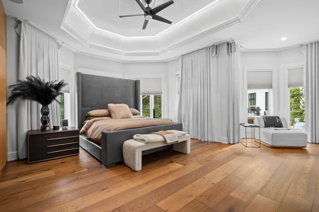 a room with gym equipment and a flat screen tv