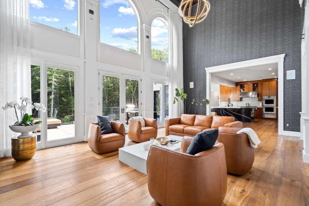 497 Old Rd To 9 Acre Corner Concord, MA 01742 - Photo 5 of 42 a living room with furniture and a large window