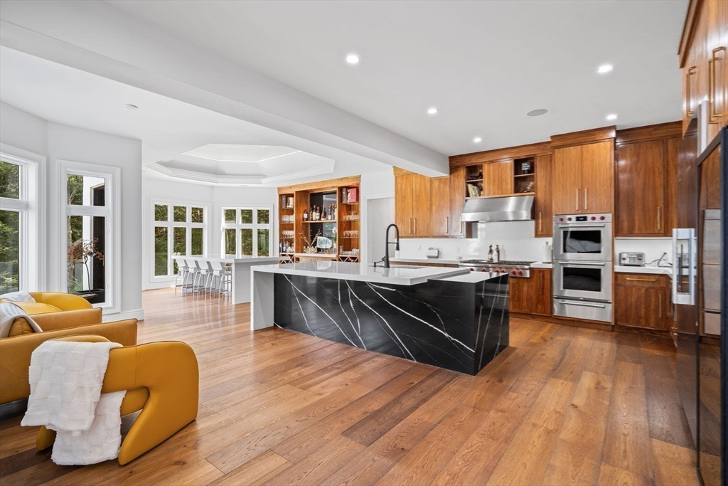 497 Old Rd To 9 Acre Corner Concord, MA 01742 - Photo 6 of 42 a large kitchen with lots of counter top space and stainless steel appliances