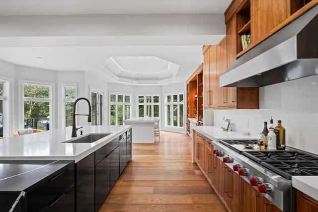 a very nice looking room with a large window and dining table