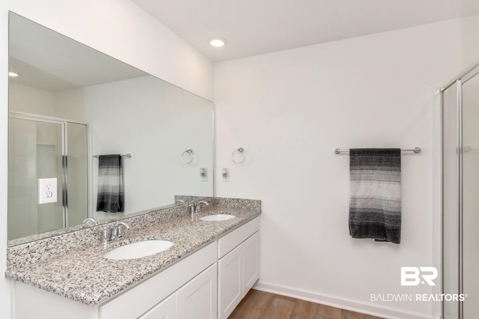 10921 Northern Dancer Court Daphne, AL 36526 - Photo 21 of 32 Bathroom with vanity, hardwood / wood-style flooring, and walk in shower