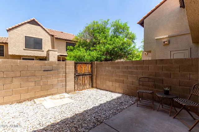 a front view of a house with a backyard