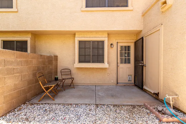 a view of house with wooden floor and chair