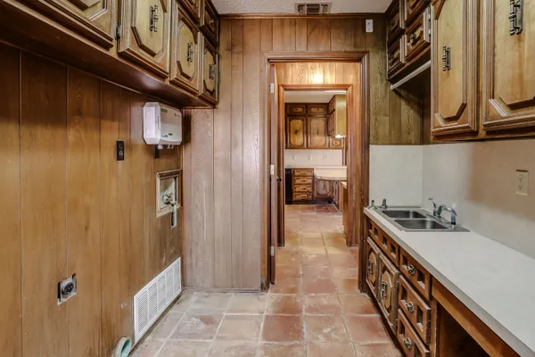 a view of front door with wooden door