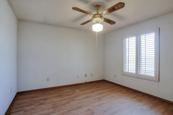 a view of balcony with furniture