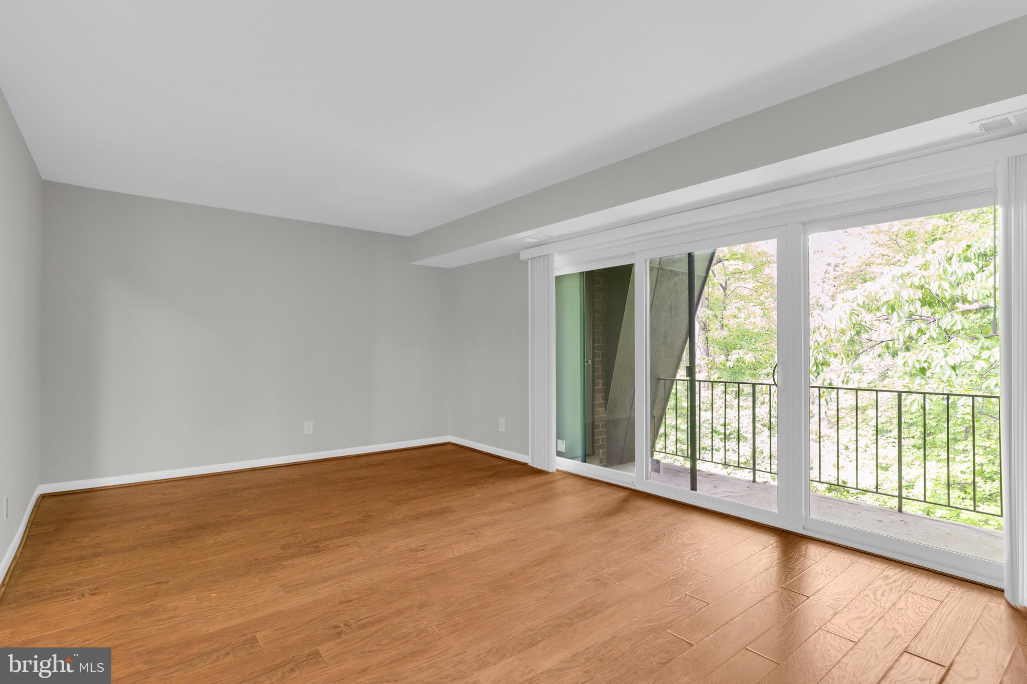11620 Vantage Hill Road, Unit 22B Reston, VA 20190 - Photo 17 of 24 a view of an empty room with a window