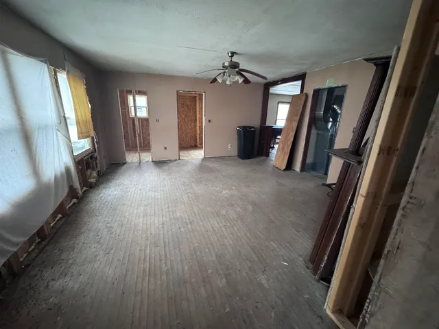 a view of a windows and a livingroom with furniture window