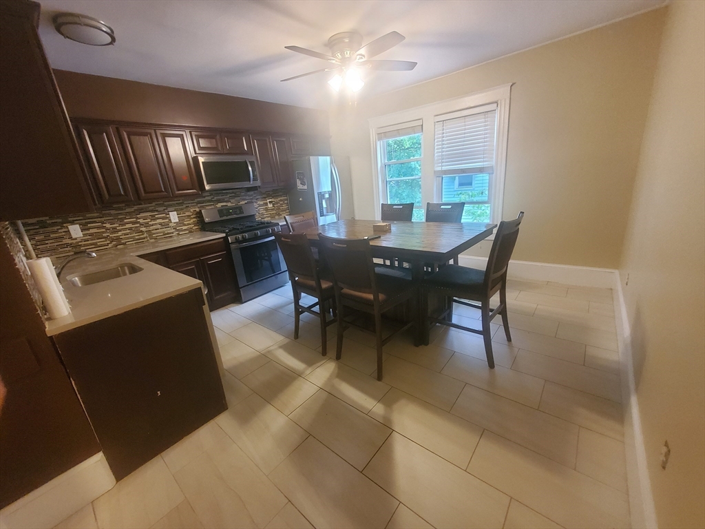 45 Intervale Street, Unit 2 Boston, MA 02121 - Photo 2 of 17 a view of a dining room with furniture