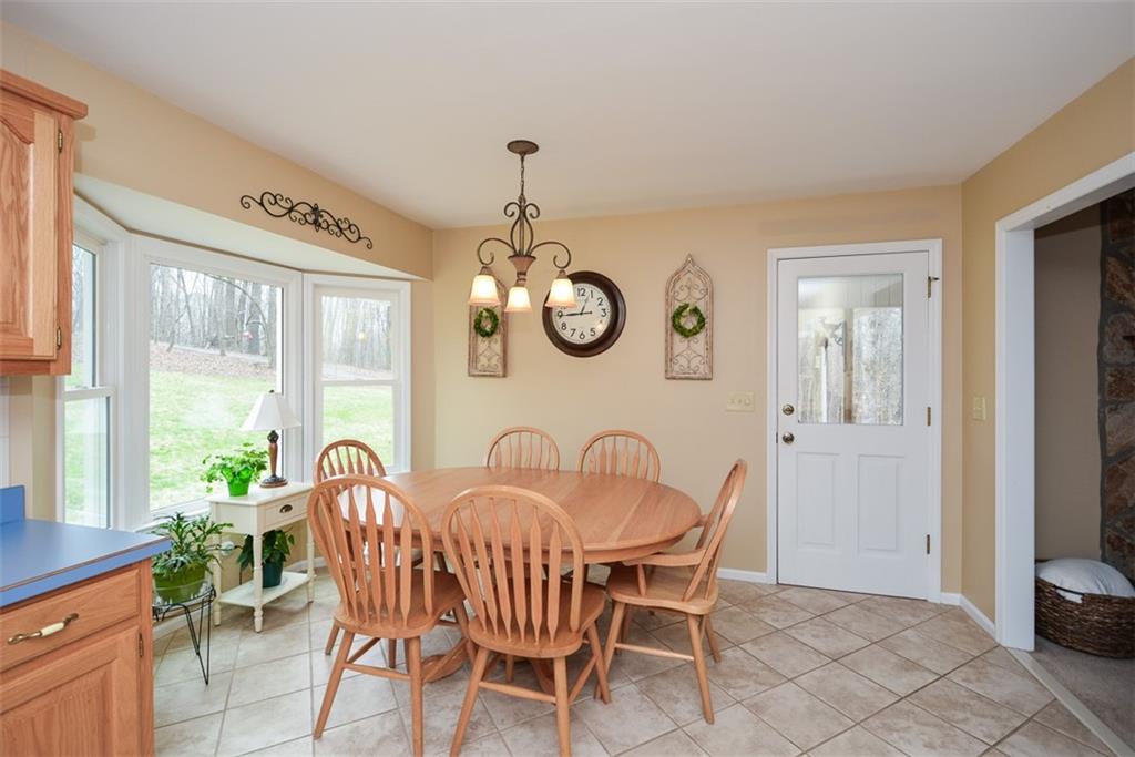 883 Tilley Road Talking Rock, GA 30175 - Photo 13 of 88 a view of a dining room with furniture window and outside view