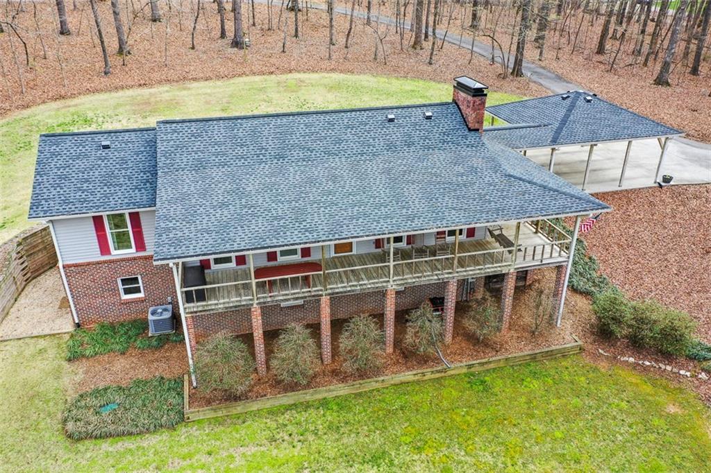883 Tilley Road Talking Rock, GA 30175 - Photo 2 of 88 a view of a house with a backyard