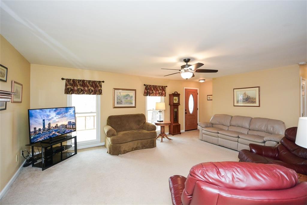 883 Tilley Road Talking Rock, GA 30175 - Photo 22 of 88 a living room with furniture and a flat screen tv