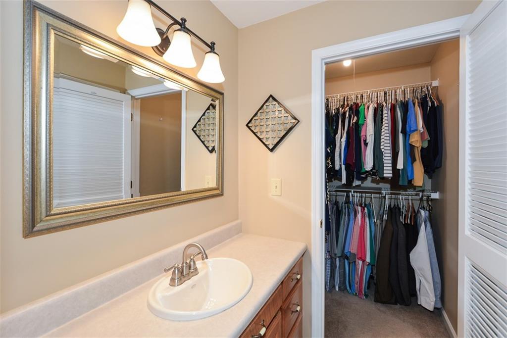 883 Tilley Road Talking Rock, GA 30175 - Photo 34 of 88 a view of walk in closet with clothes and shoes