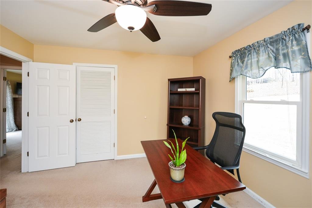 883 Tilley Road Talking Rock, GA 30175 - Photo 38 of 88 a view of a workspace with furniture and a window