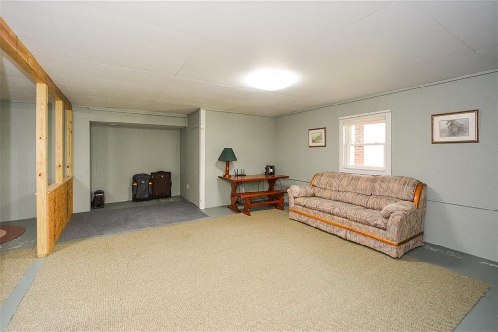 883 Tilley Road Talking Rock, GA 30175 - Photo 45 of 88 a living room with furniture and a flat screen tv