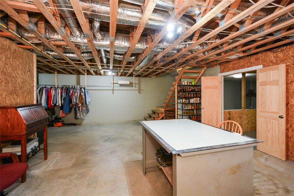 883 Tilley Road Talking Rock, GA 30175 - Photo 48 of 88 a view of storage and utility room with stairs