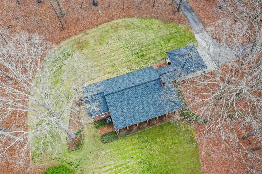 883 Tilley Road Talking Rock, GA 30175 - Photo 73 of 88 a view of a backyard with a tree