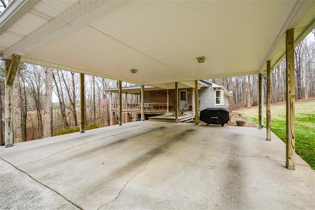 883 Tilley Road Talking Rock, GA 30175 - Photo 74 of 88 a view of a building with car parked