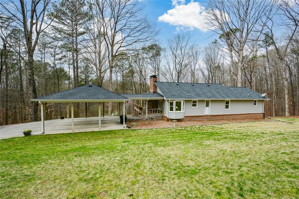 883 Tilley Road Talking Rock, GA 30175 - Photo 76 of 88 a front view of a house with a yard