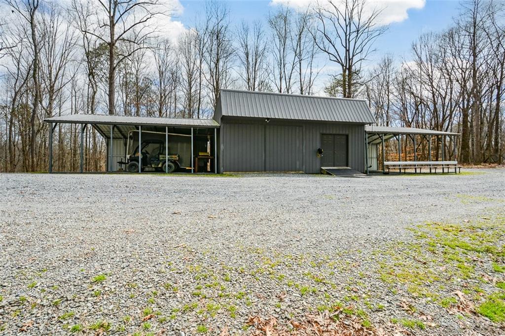 883 Tilley Road Talking Rock, GA 30175 - Photo 10 of 88 a front view of a house with a yard