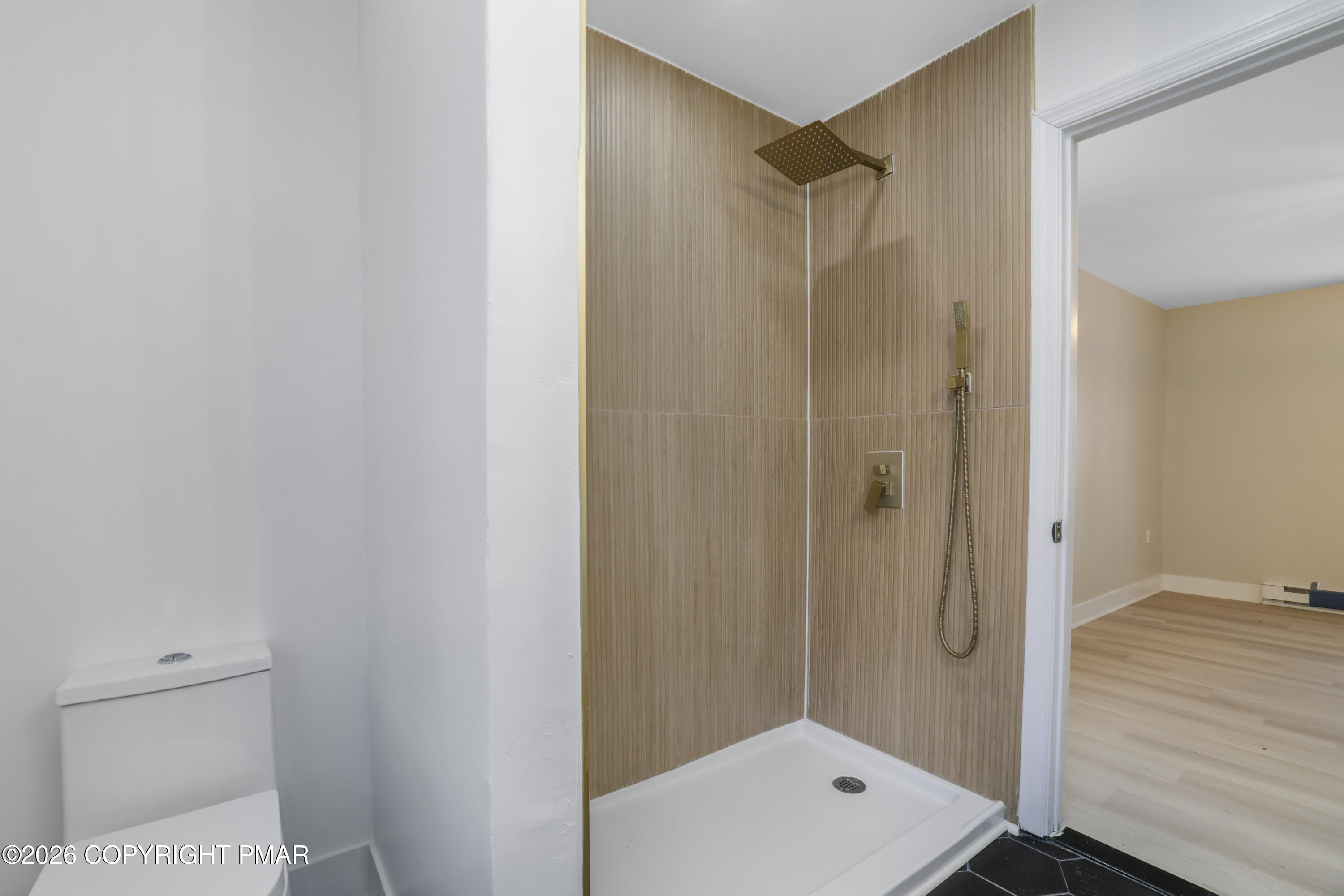 147 Pocono Boulevard Bushkill, PA 18324 - Photo 23 of 38 a bathroom with a shower and a toilet