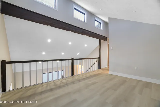 a view of an empty room and window