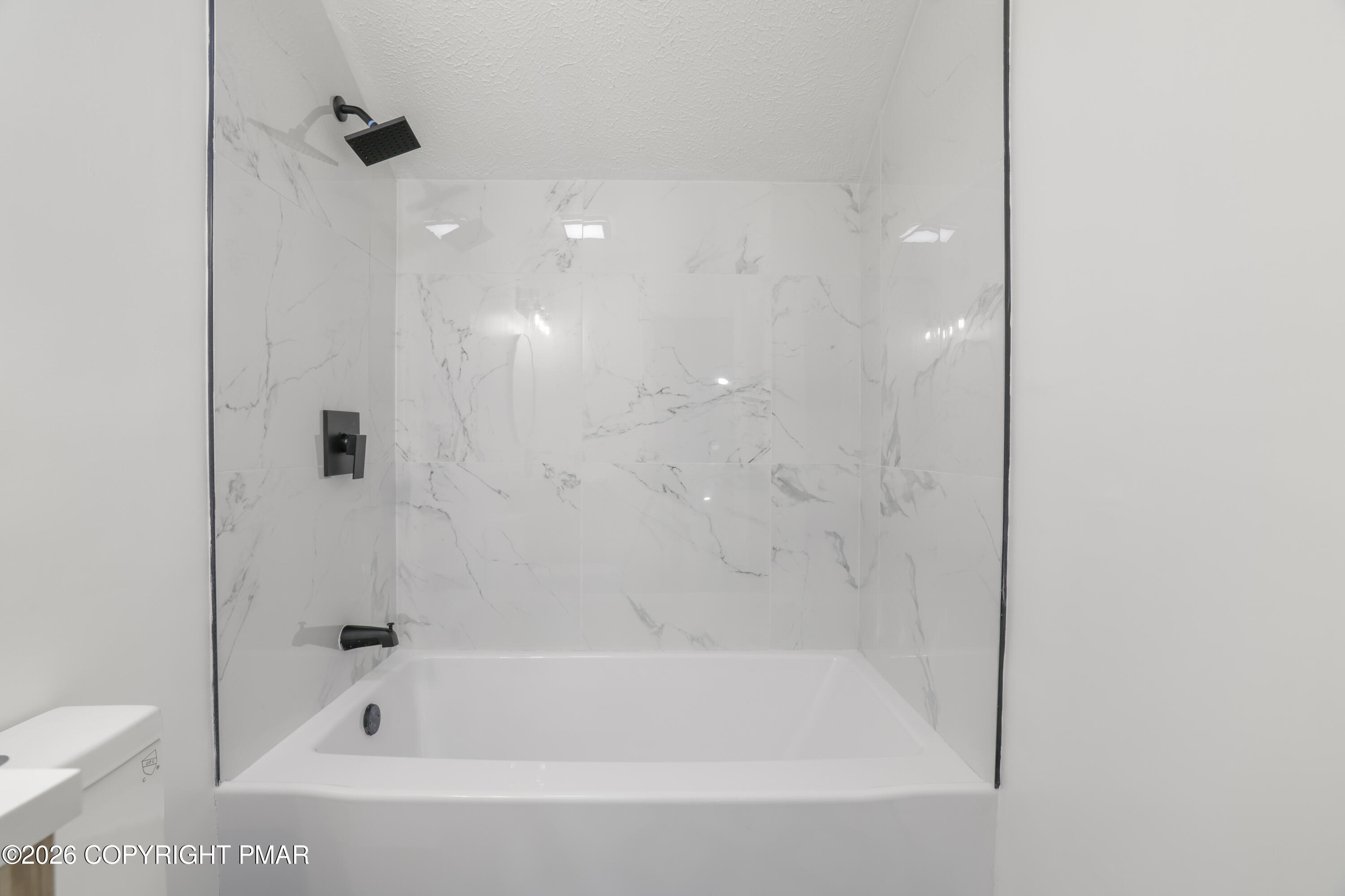147 Pocono Boulevard Bushkill, PA 18324 - Photo 33 of 38 a bathroom with a bathtub