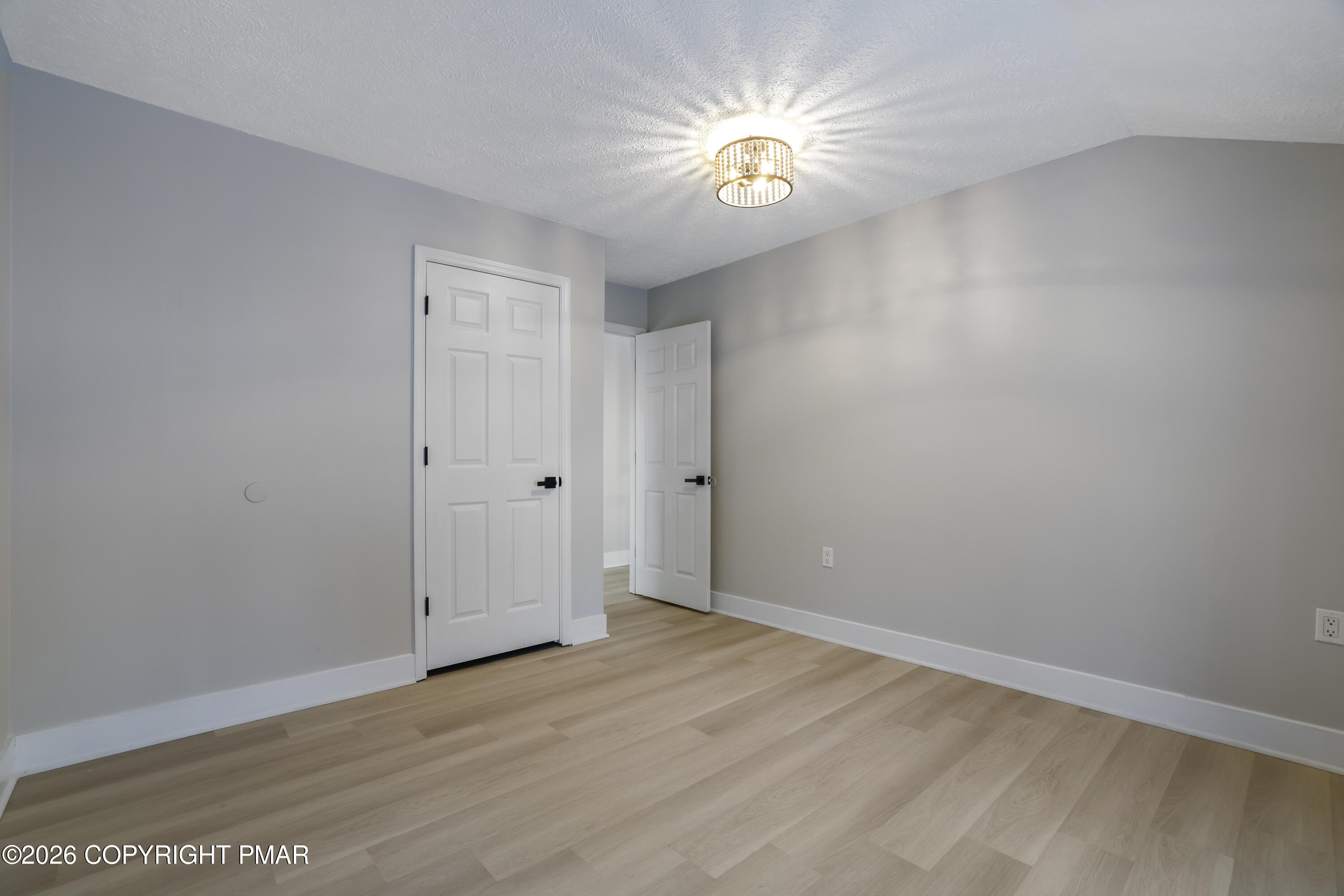 147 Pocono Boulevard Bushkill, PA 18324 - Photo 34 of 38 wooden floor in an empty room