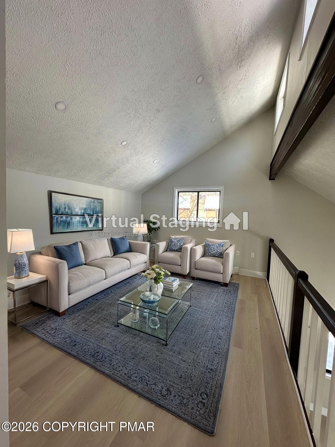 147 Pocono Boulevard Bushkill, PA 18324 - Photo 38 of 38 a living room with furniture and a rug