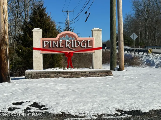 a view of an entryway with kitchen