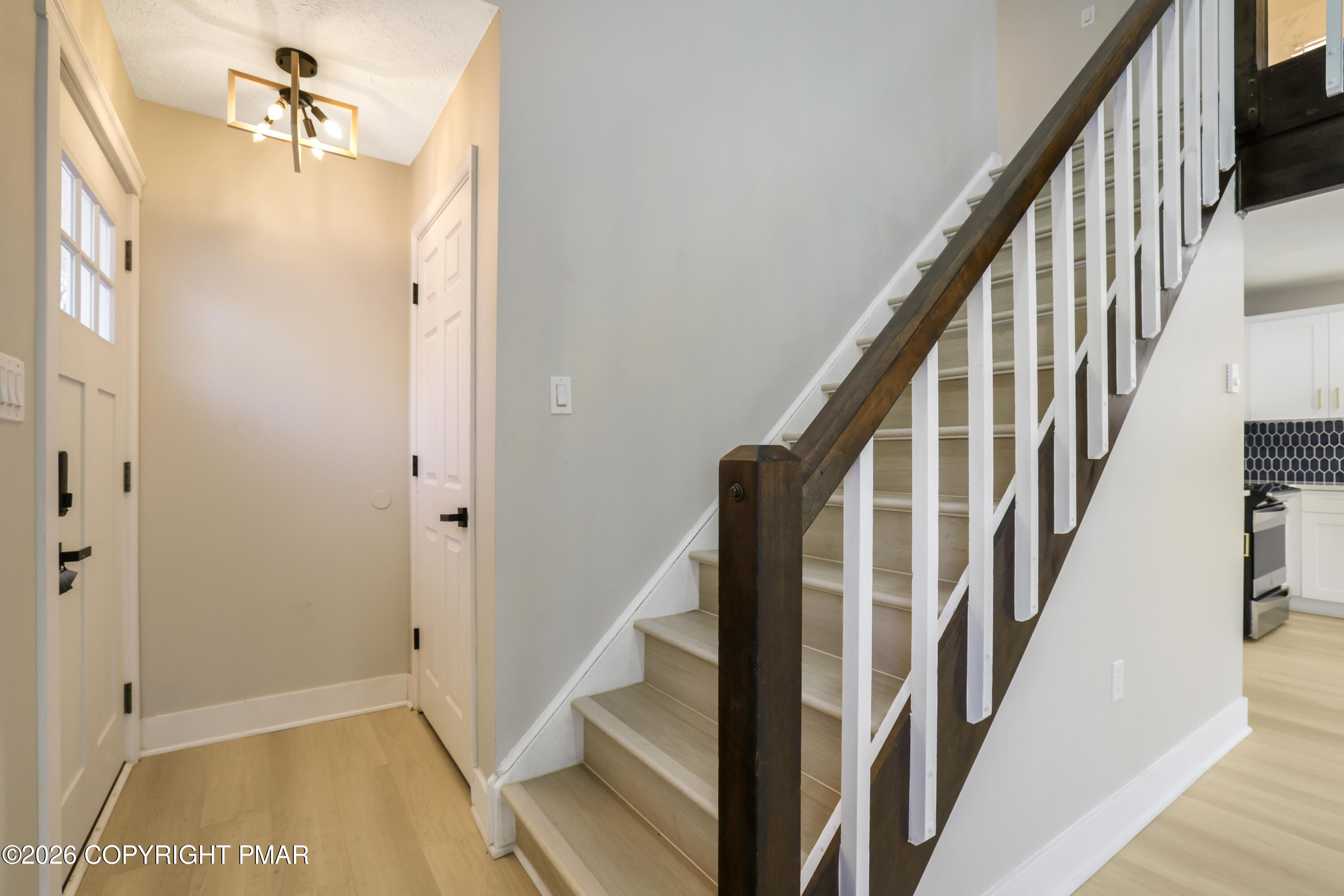 147 Pocono Boulevard Bushkill, PA 18324 - Photo 10 of 38 a view of an entryway with staircase