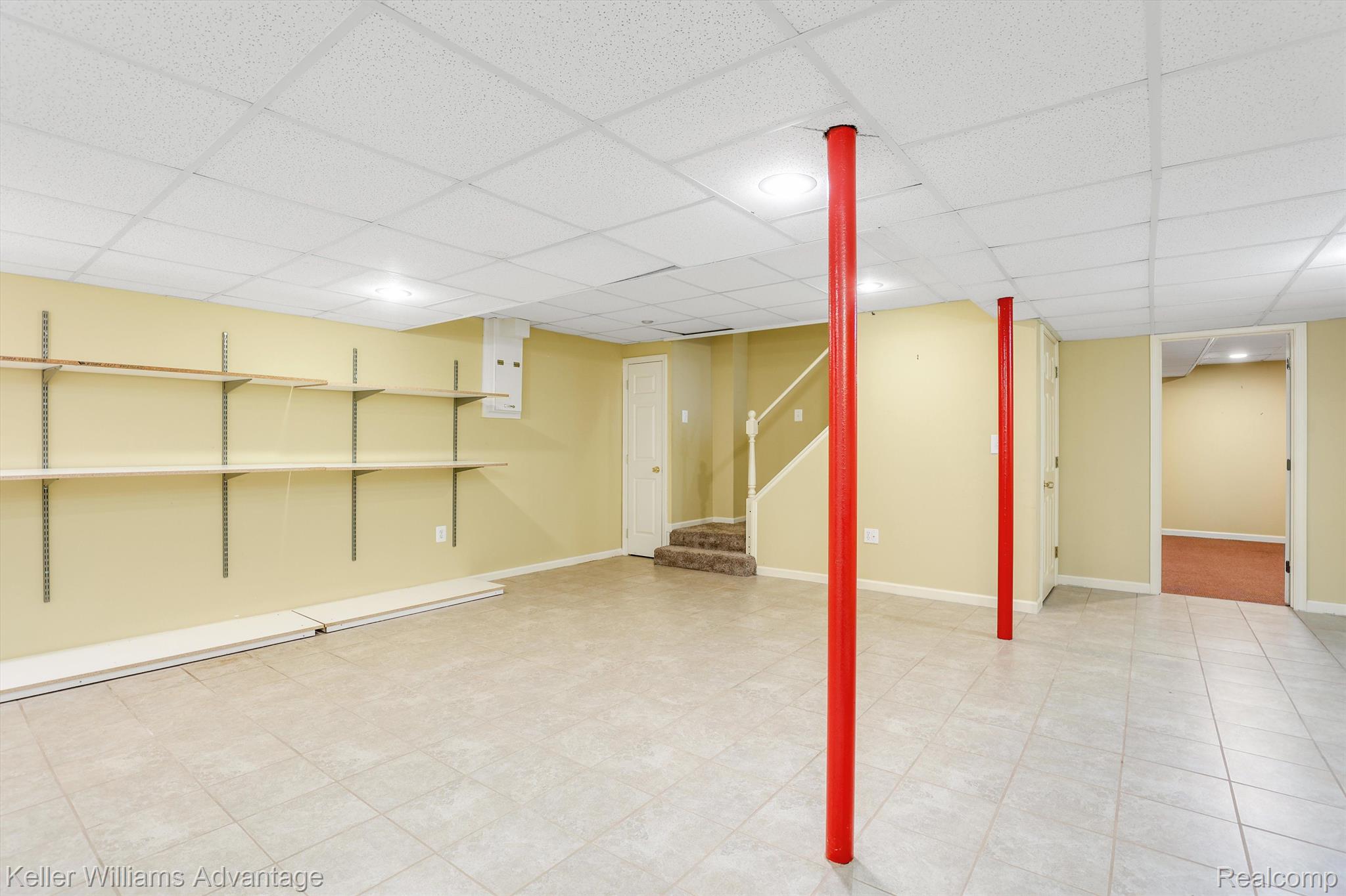 229 Aintree Road Rochester, MI 48306 - Photo 24 of 40 basement rec room has plenty of shelving