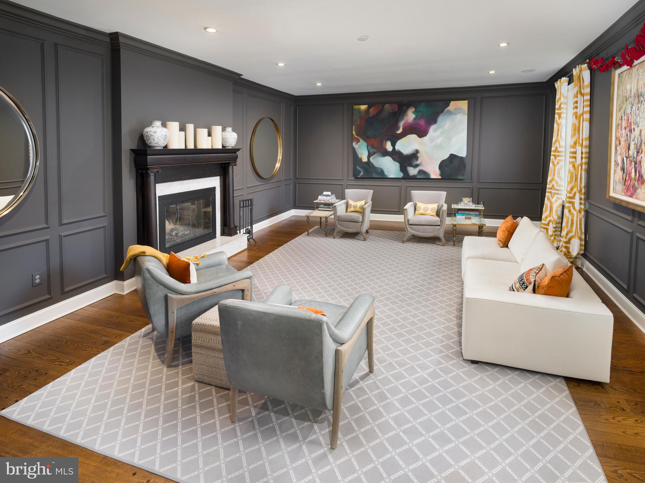 1685 Valley Road Newtown Square, PA 19073 - Photo 13 of 53 a living room with furniture a fireplace and a flat screen tv