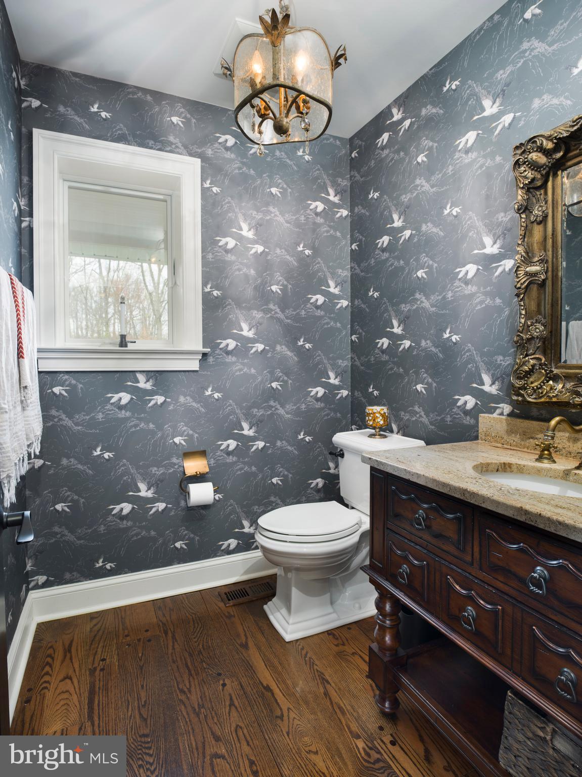 1685 Valley Road Newtown Square, PA 19073 - Photo 16 of 53 a bathroom with a sink a toilet and mirror