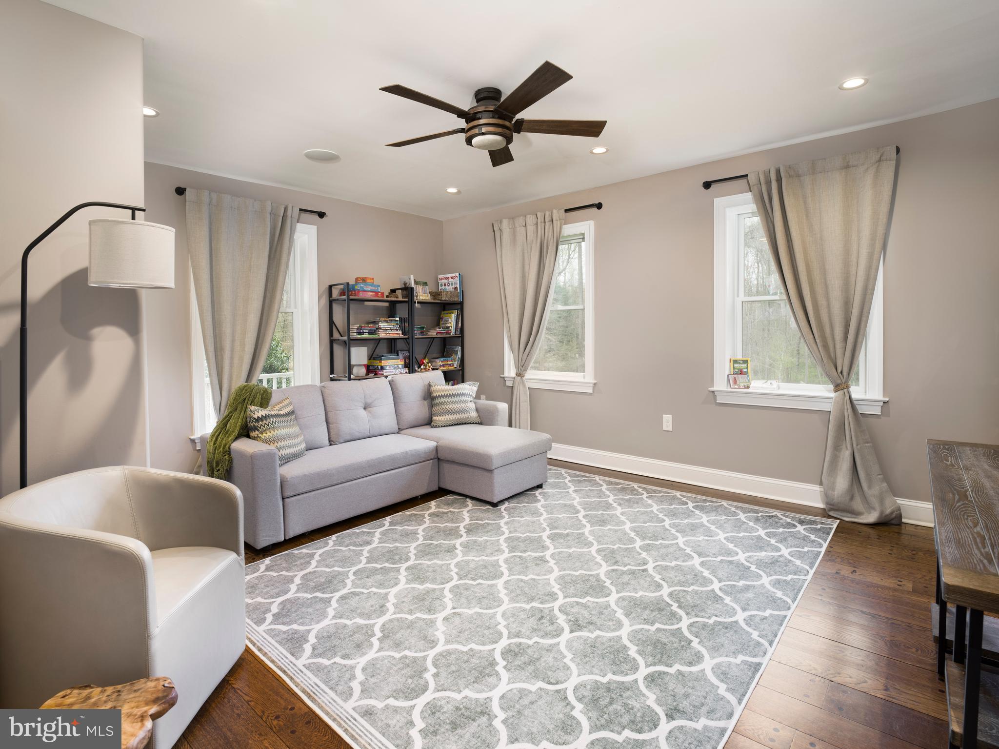 1685 Valley Road Newtown Square, PA 19073 - Photo 17 of 53 a living room with furniture and a window