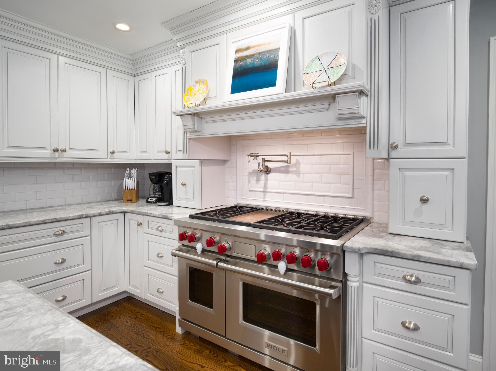 1685 Valley Road Newtown Square, PA 19073 - Photo 23 of 53 a kitchen with stainless steel appliances granite countertop a stove and a sink