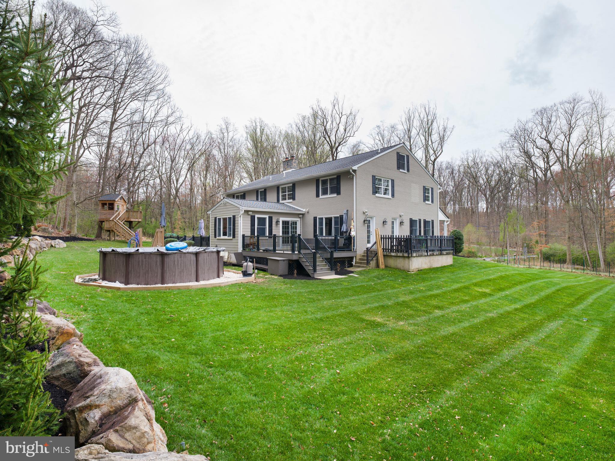 1685 Valley Road Newtown Square, PA 19073 - Photo 51 of 53 a view of a house with a big yard and large trees