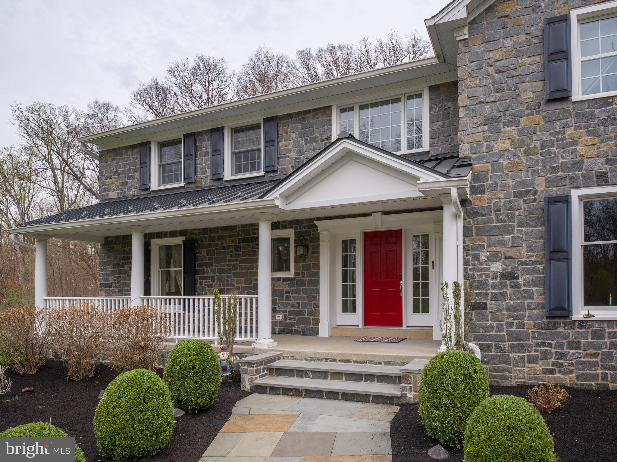 1685 Valley Road Newtown Square, PA 19073 - Photo 8 of 53 a front view of a house with a yard