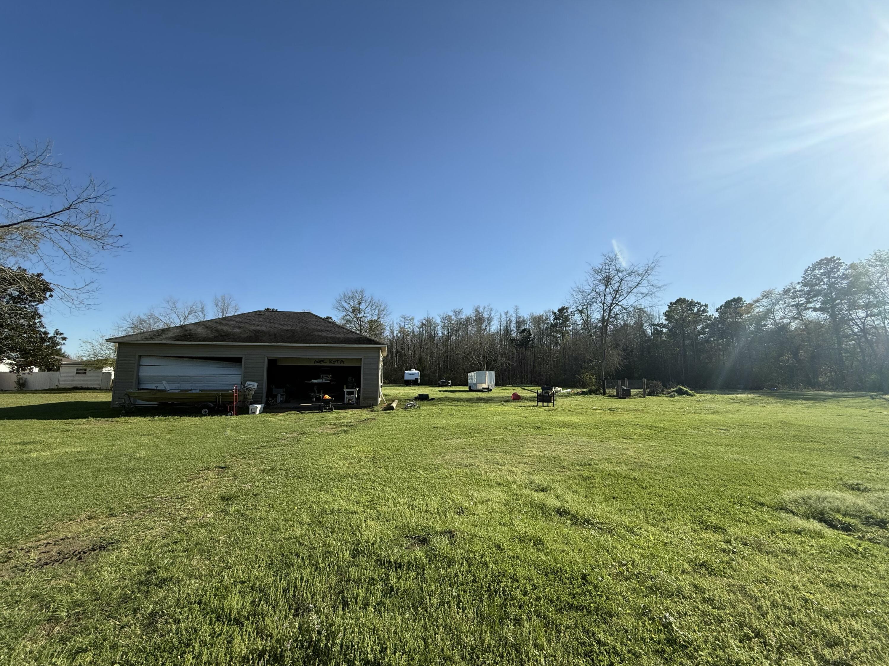 0 State Road 4 Century, FL 32535 - Photo 3 of 8 a view of house with an outdoor space
