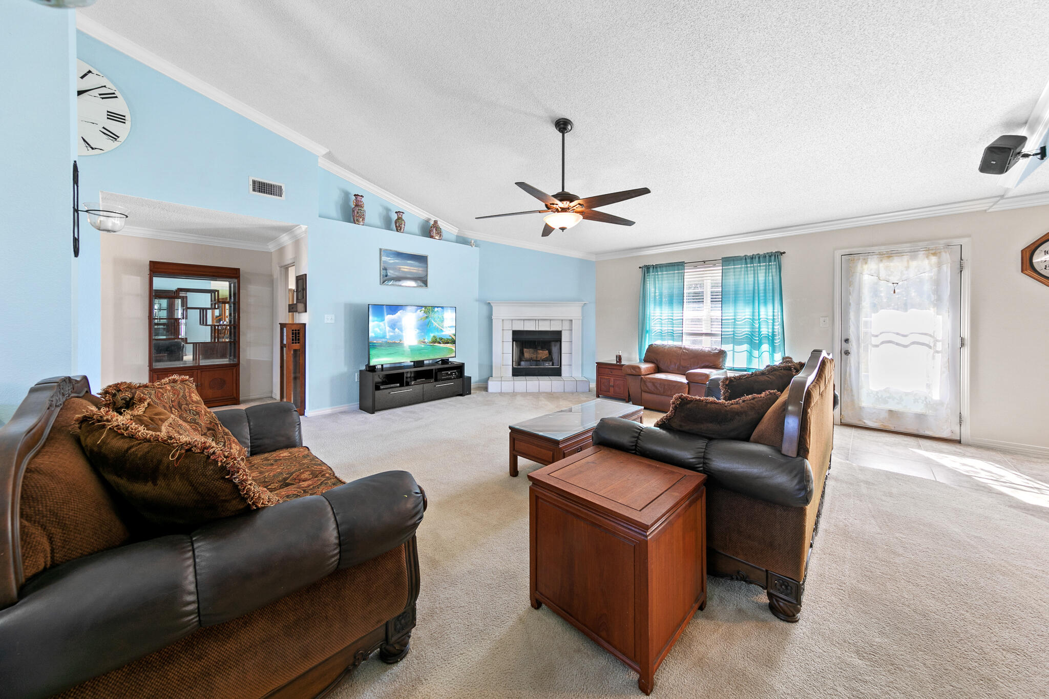 6735 Britt Street Navarre, FL 32566 - Photo 12 of 42 a living room with furniture and a fireplace