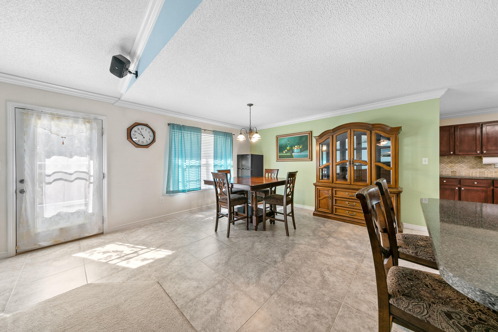 6735 Britt Street Navarre, FL 32566 - Photo 18 of 42 a view of a dining room with furniture window and outside view