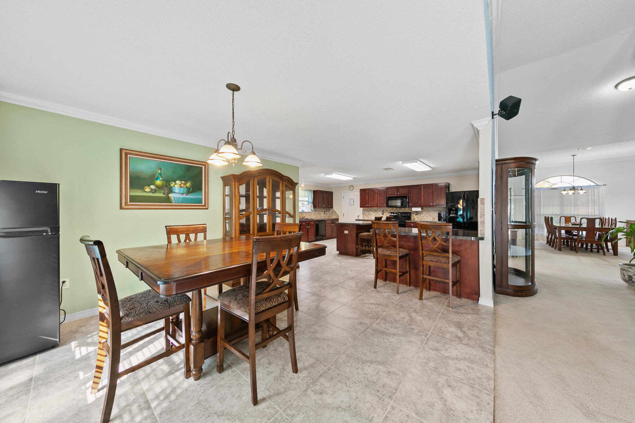 6735 Britt Street Navarre, FL 32566 - Photo 19 of 42 a view of a dining room with furniture