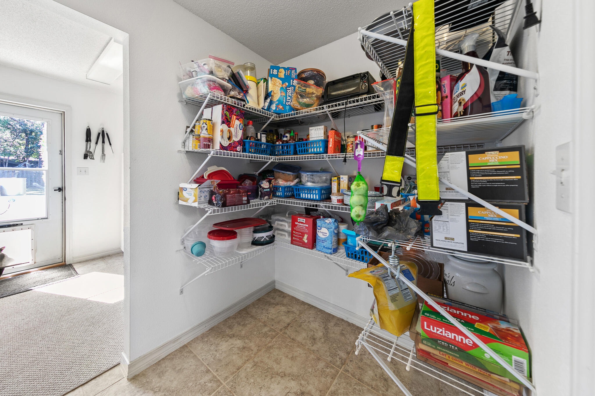 6735 Britt Street Navarre, FL 32566 - Photo 35 of 42 a room with storage and utility