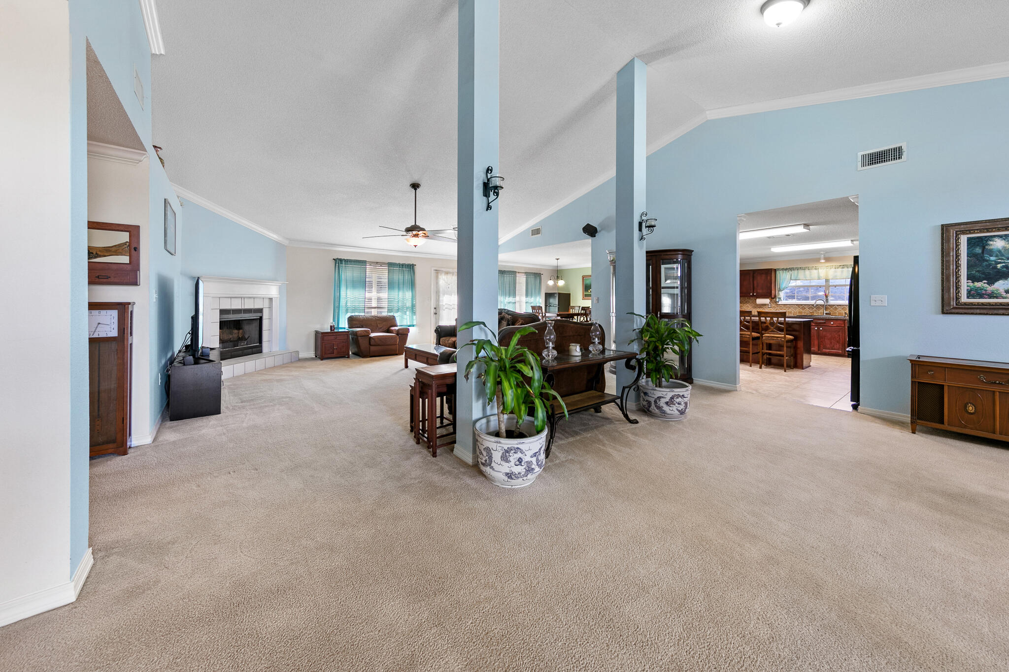 6735 Britt Street Navarre, FL 32566 - Photo 9 of 42 a view of a livingroom with furniture and a large window