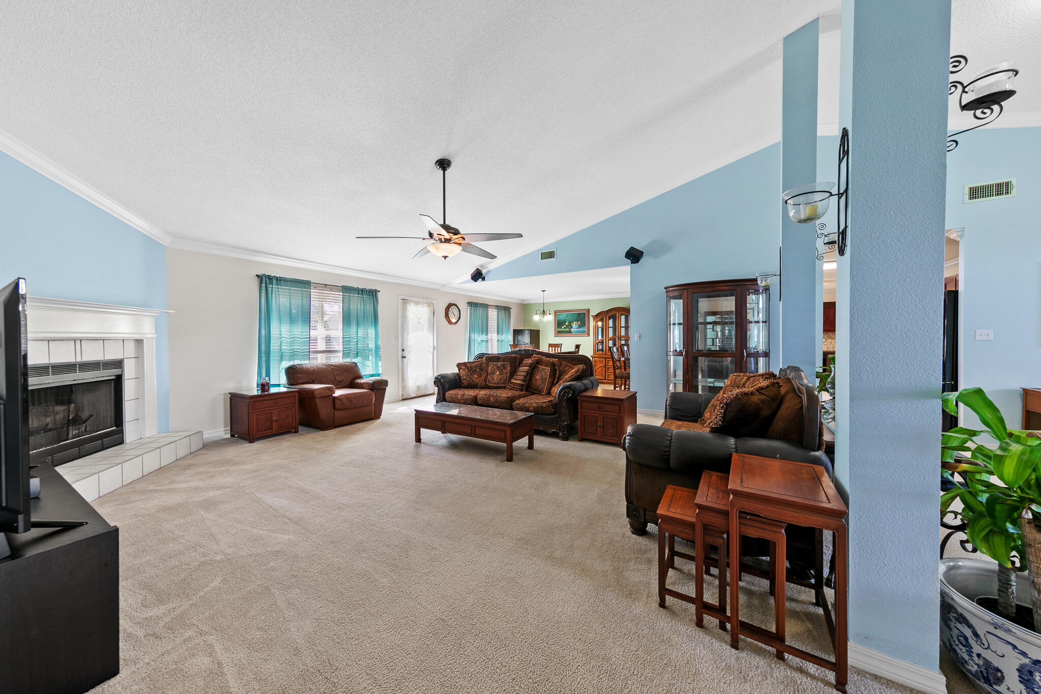 6735 Britt Street Navarre, FL 32566 - Photo 10 of 42 a living room with furniture and a fireplace